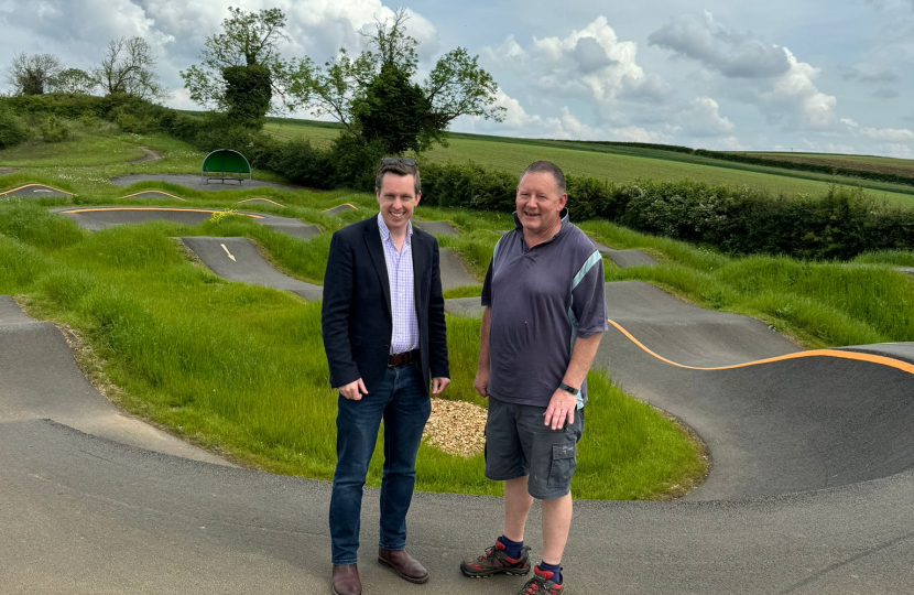 Tom and Simon posing for a photograph on KC Active's new 'pump track.'